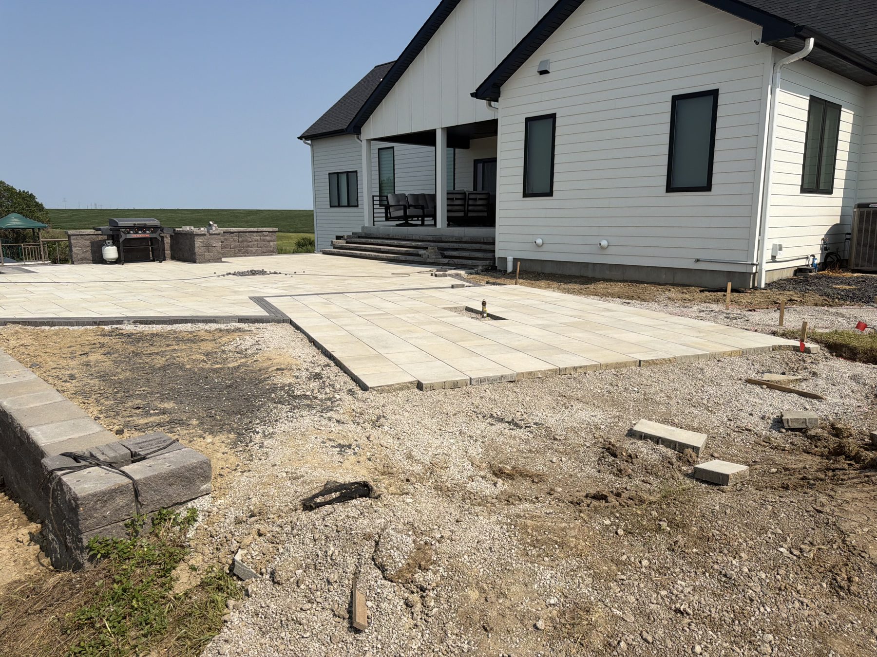 Completed outdoor kitchen and patio installation