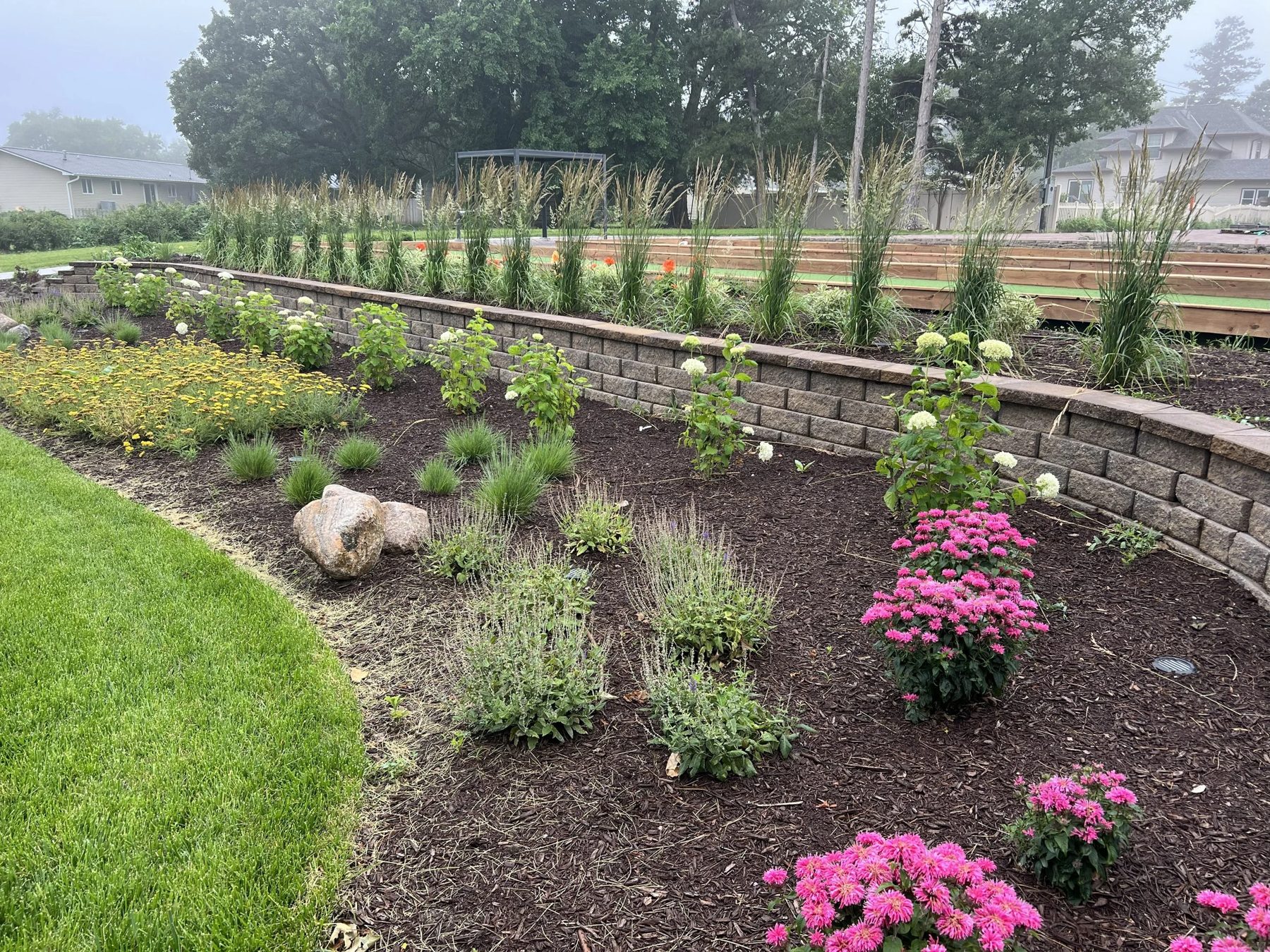 Tiered retaining wall with garden landscaping
