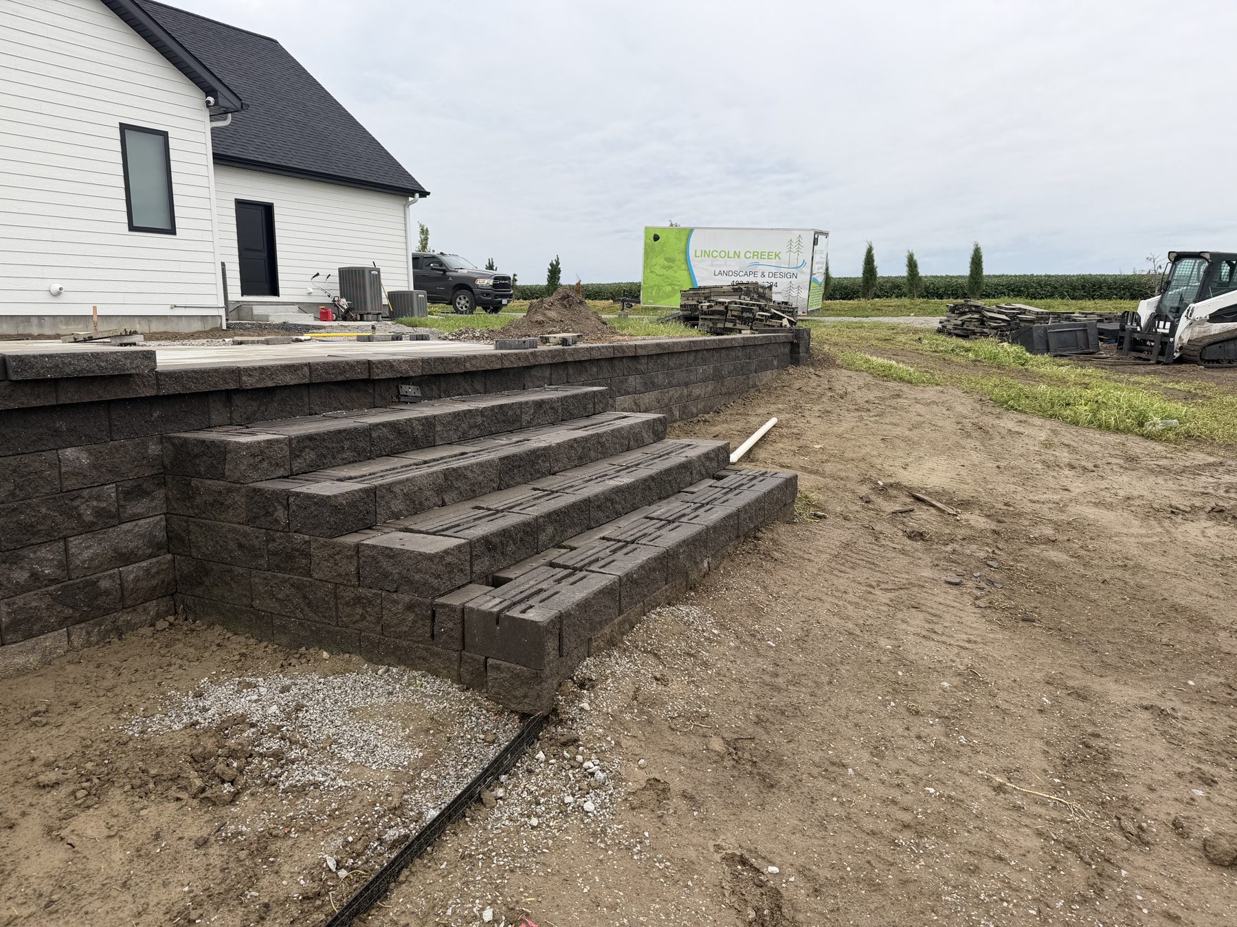 Custom stone staircase and full-yard landscape design — 3D landscape design process, central Nebraska